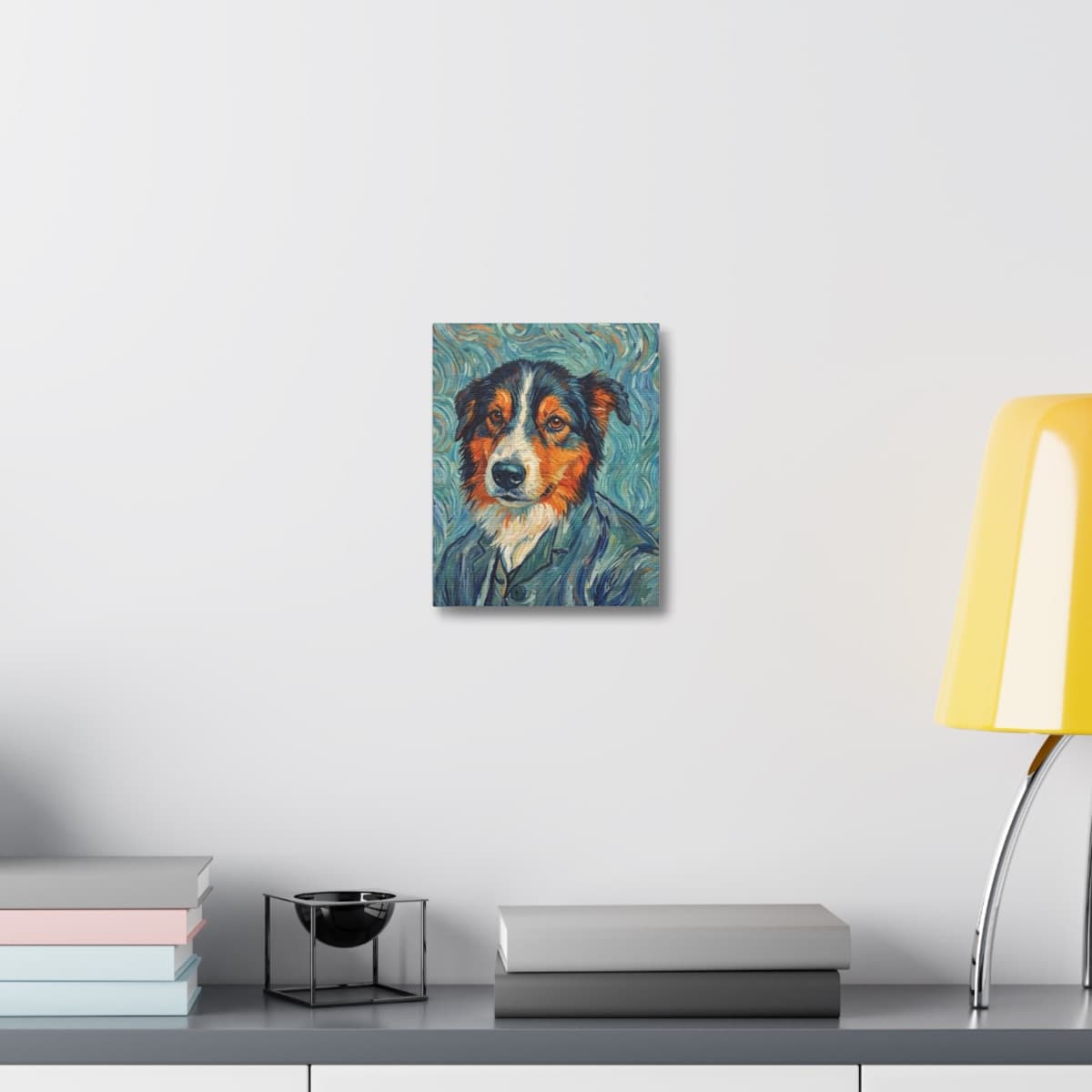 A gallery-wrapped canvas of a Van Gogh-style border collie portrait hanging on a white wall above a sideboard.